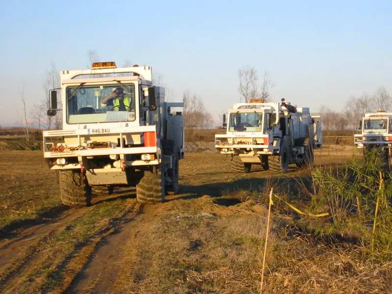 AGS vibroseis trucks working a line